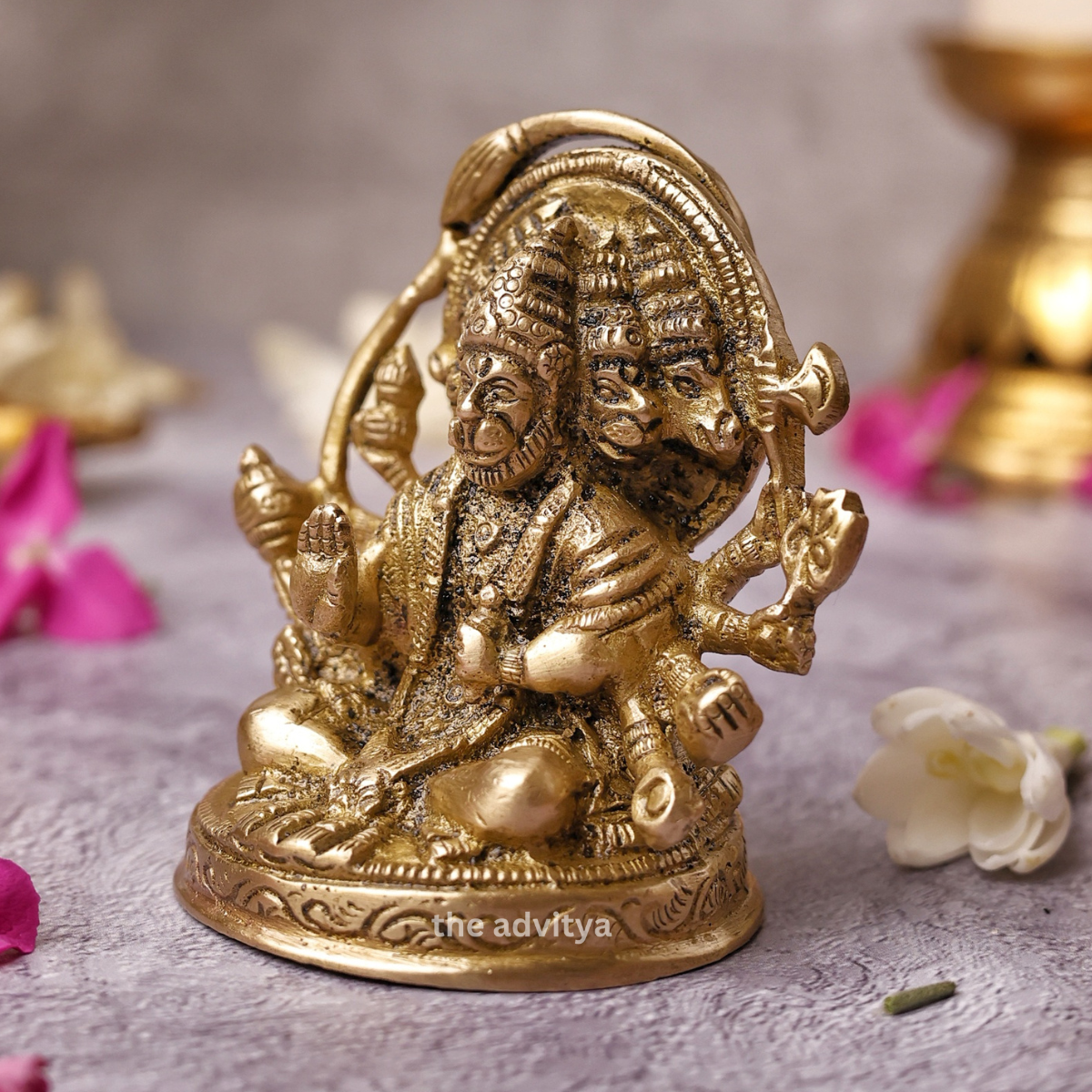 Side angle view of Brass Panchmukhi Hanuman Murti with detailed craftsmanship