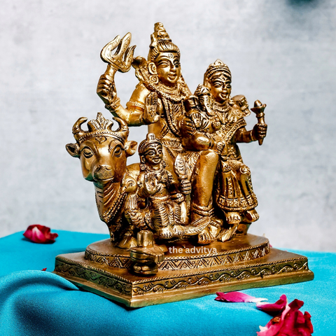 Right-angle brass Shiv Parivar murti with Nandi highlighting fine craftsmanship.