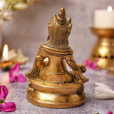 Back view of the Sitting Lord Kuber Idol showing smooth finish and craftsmanship.